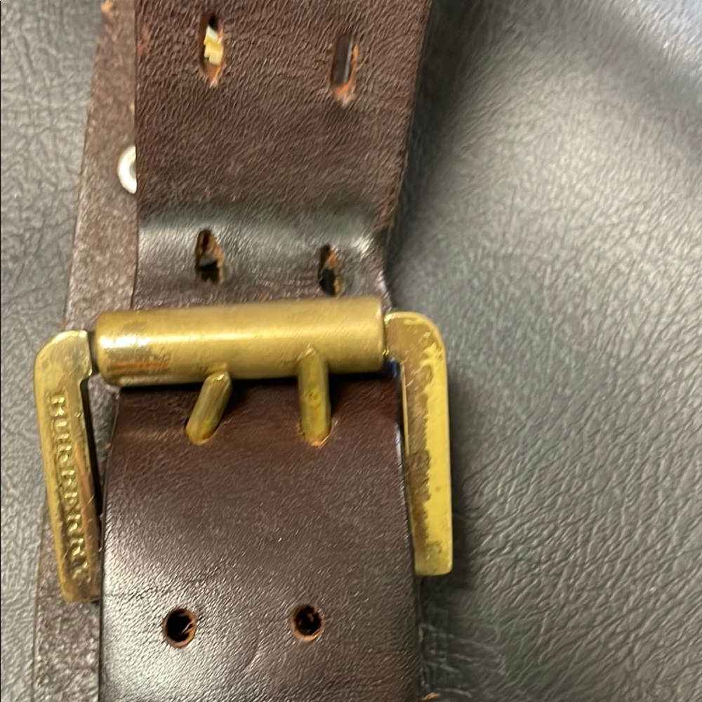 Burberry vintage Brown Leather belt with Brass Buckle and brass gold grommets .